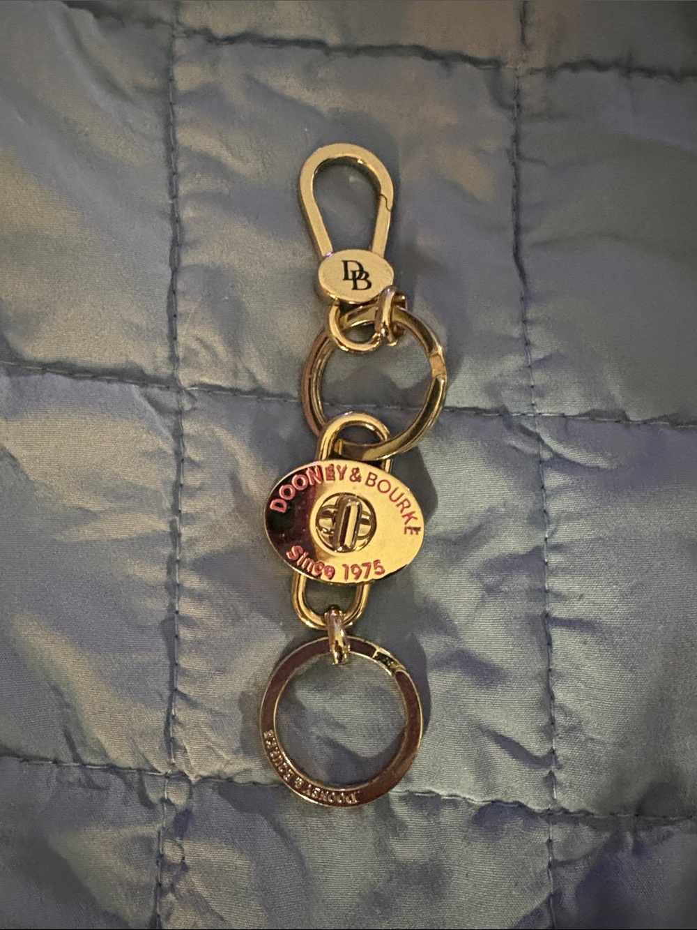 Dooney & Bourke Gold Logo Key Fob like new
